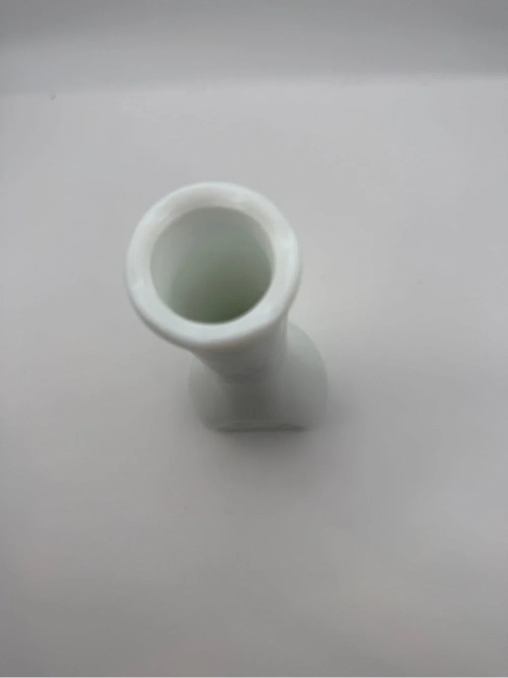 Vintage vase milk glass with embossed vines and scalloped rim